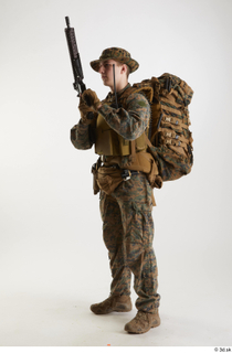 Casey Schneider Paratrooper Pose 4 loading gun standing whole body…